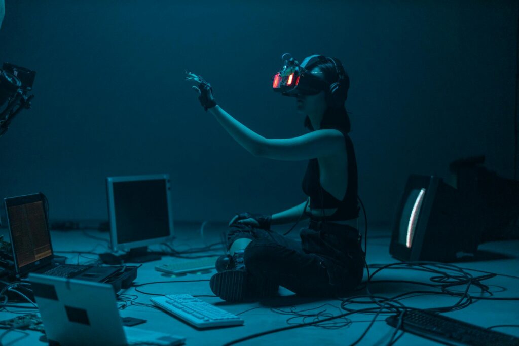 a woman in a tank top using a vr headset